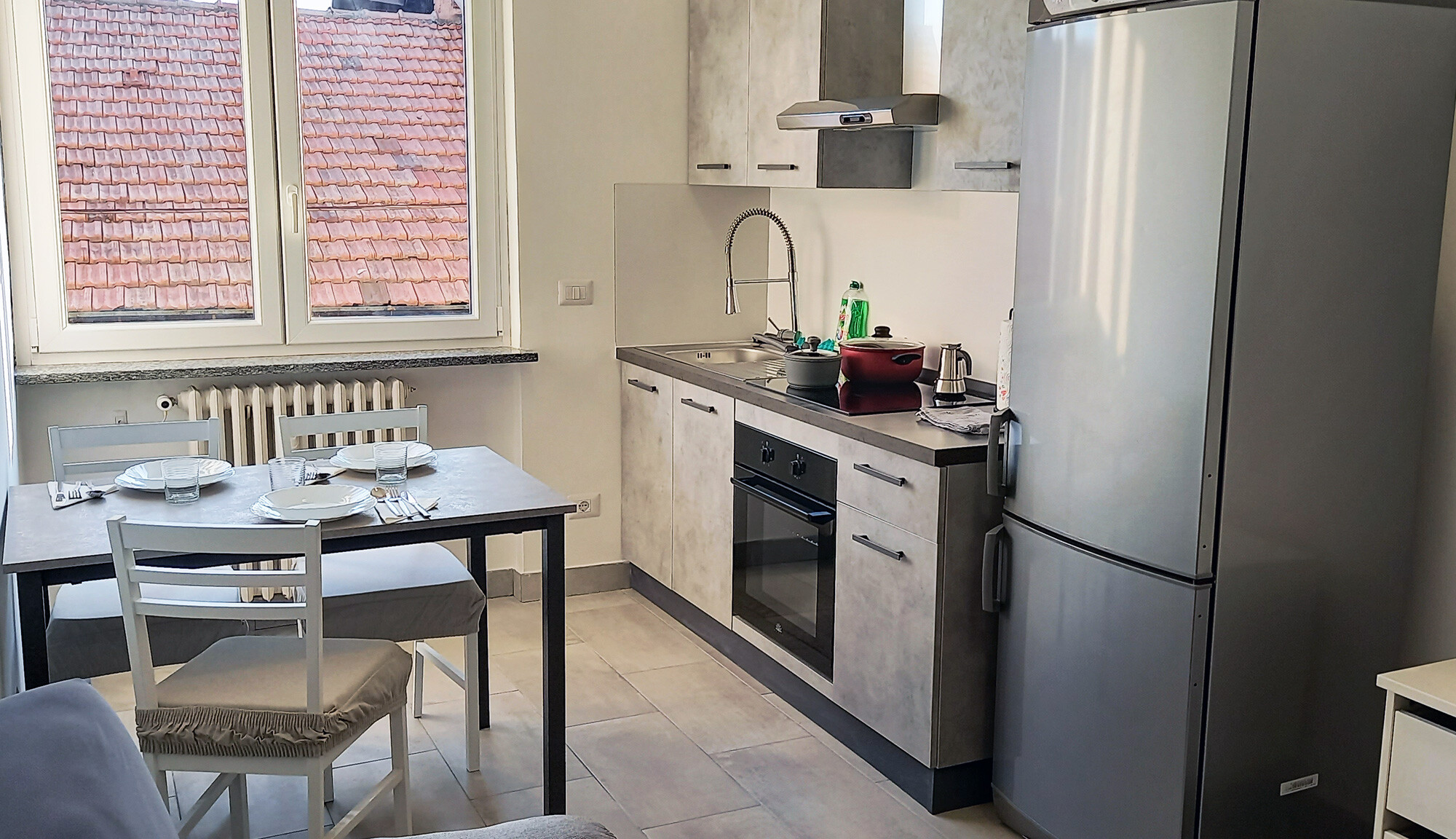 Impianto domotico a Gallarate. Impianto elettrico domotico Control Casa, appartamento ristrutturato. Salotto cucina.